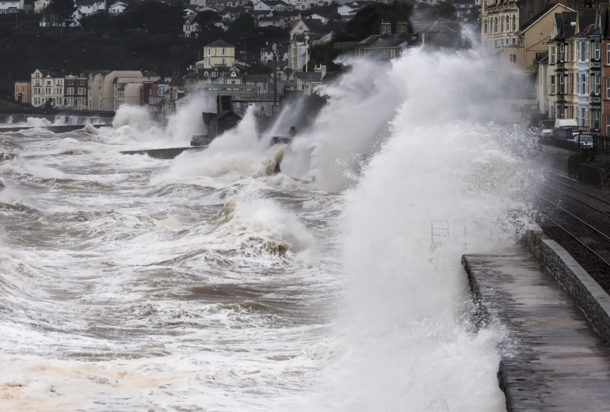 This is Dawlish, Devon where the sea wall was badly damaged early in 2014. The waves are breaking particularly fiercely against the part of the wall where it was widened and reconstructed. This part of the wall was closed for about 18 months.